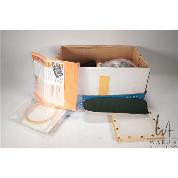 Box of crafting and sewing supplies including fabric, scissors, embroidery silks etc.