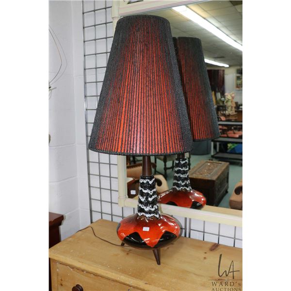Mid Century Modern table lamp, possibly by Maurice Chalvignac, with tri-pod legs and red and black l