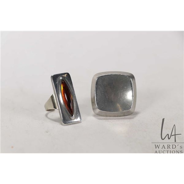 Two vintage mid century modernist adjustable rings by Jorgen Jensen of Denmark including amber colou