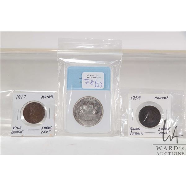 Three Canadian coins including 1962 silver dollar 1917 King George large cent, and 1859 Queen Victor
