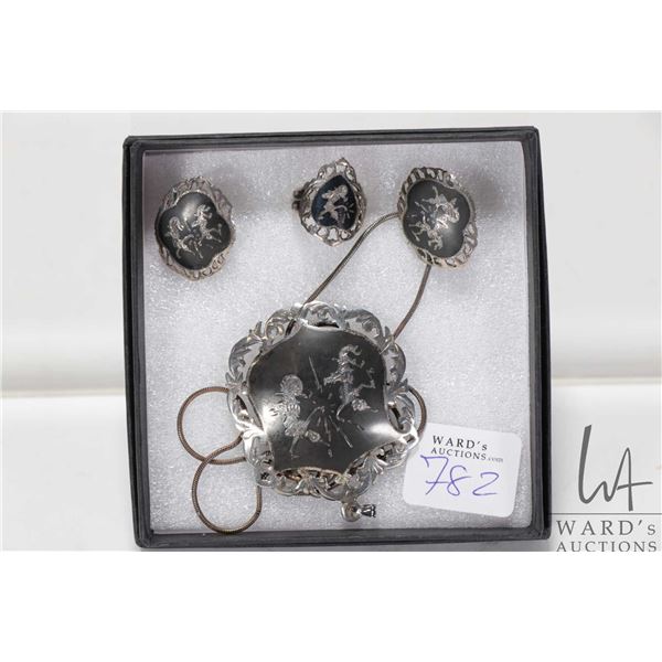 Siamese sterling silver brooch/ pendant with a pair of matching earrings and a ring sized 4.25