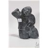 Image 1 : Inuit soapstone carved figure of a man, signed in syllabics, 7 1/2" in height