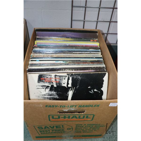 Box of vintage LP's including Rolling Stones, Joan Jett, Emmylou Harris, Gordon Lightfoot, Chilliwac