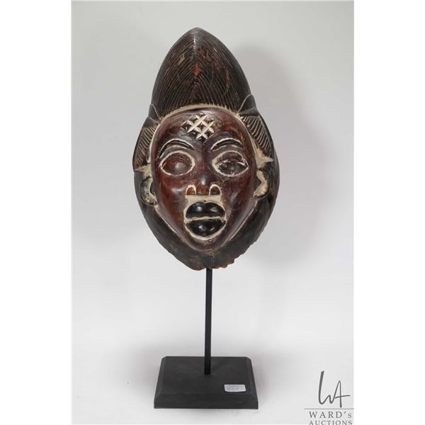 Hand carved Punu mask, purportedly originating from the Punu people of Gabon South Africa, 18 1/2" i