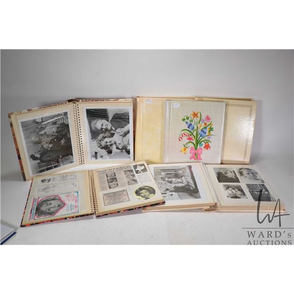 Six albums containing a selection of Shirley Temple photographs and ephemera including paper dolls, 