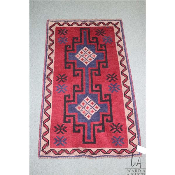 Small wool carpet with double medallions, red background and highlights of taupe, blue and black, 30