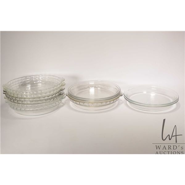 Eleven Pyrex 10" diameter pie plates
