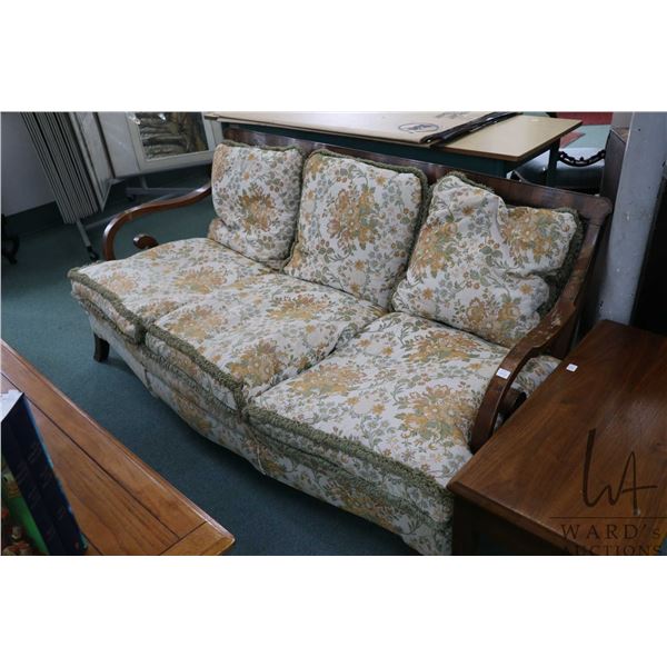 Antique three piece parlour set including 66" sofa and two chairs, all with scroll design open arms 