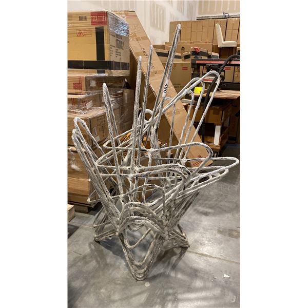 STACK OF BLACK METAL CHAIR FRAMES