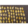 Image 28 : RIBBON SHIRT TIN CONES AND COWRIE SHELLS