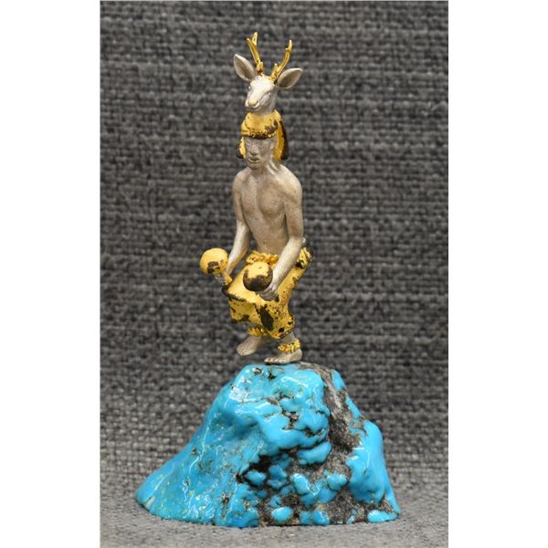 ZUNI SILVER AND SCULPTURE (MIKAEL REDMAN)