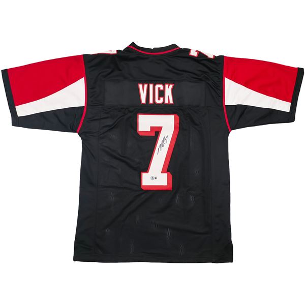 MICHAEL VICK SIGNED FOOTBALL JERSEY - BECKETT COA
