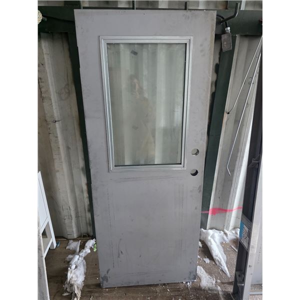Metal door- Approx 32" by 79"H