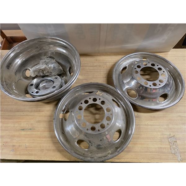 Stainless steel wheel liner for a truck