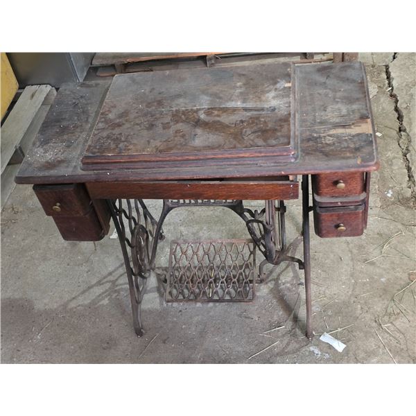 Singer sewing machine and treadle