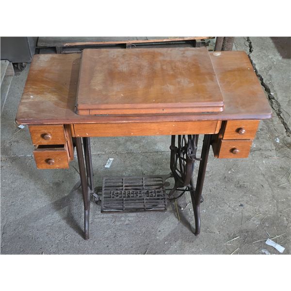Singer sewing machine and treadle