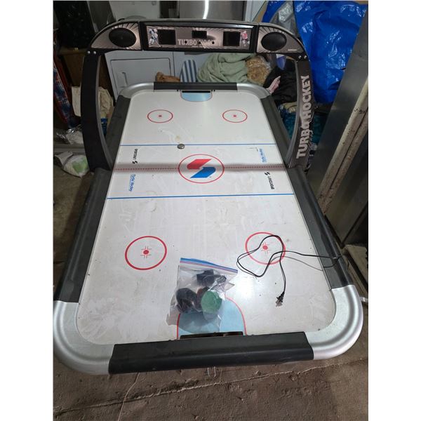 Air hockey table- 50" by 90" by 32"H- works