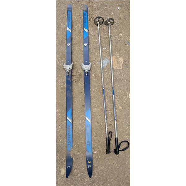 Pair of Vintage wood skis and poles