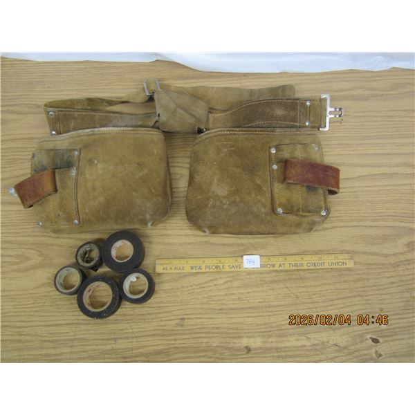 Leather Tool Belt Full of Nails and Rolls of Electrical Tape