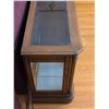 Image 3 : Solid wood and beveled glass lighted display cabinet- 56" by 16" by 30"H- has mirrored back, lights