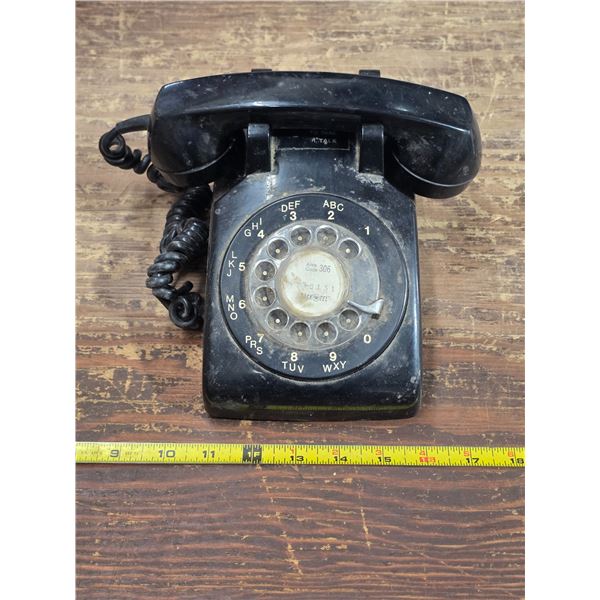 Black rotary telephone