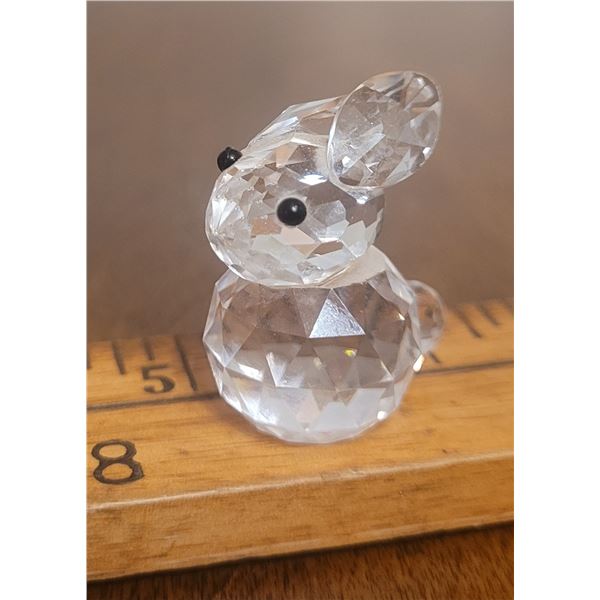 Miniature crystal rabbit in vintage yellow lidded aluminum film cannister