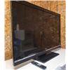 Image 1 : SONY BRAVIA TV with controller 28 1/4" x 44" WORKING - on a stand