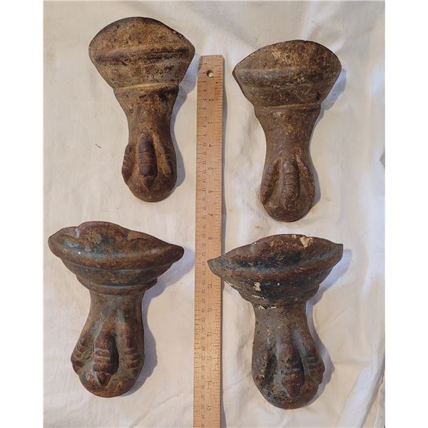 Four cast iron clawfoot tub legs