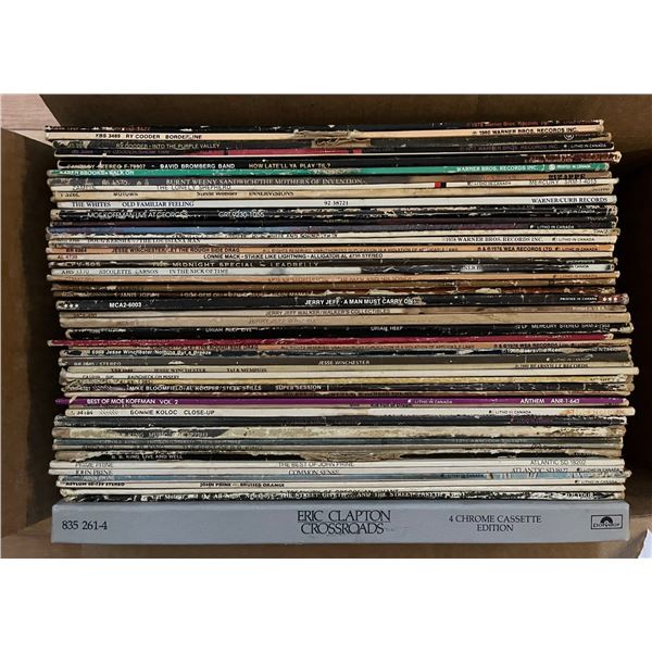 Box of 50ish vinyl record albums. Mostly 1970s. Used condition. Guitar based music.