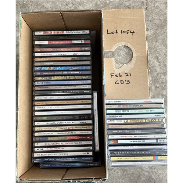Box of music CDs. Guitar based music.