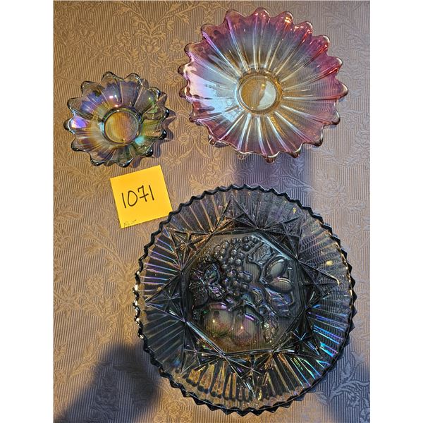 Iridescent Carnival Glass pink is 9", blue is 6" and purple 11-1/4" with hole in middle