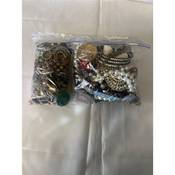 2 BAGS OF MISC JEWELLRY AND PARTS, SOME WATCHES, ETC