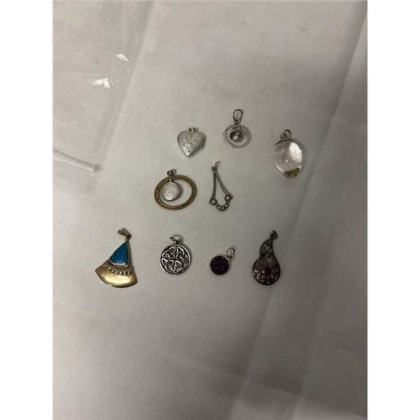 9 VINTAGE SILVER PENDANTS, SOME ARE STERLING SILVER