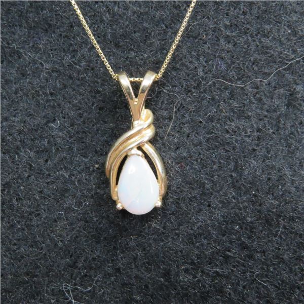 14K Yellow gold 20" chain with 14K yellow gold & opal pendant.  Very nice! Marked 14K