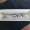 Image 1 : STERLING Vintage charm bracelet with 11 charms.  Beautiful!  Marked Sterling
