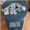 Image 2 : STERLING Vintage charm bracelet with 11 charms.  Beautiful!  Marked Sterling