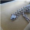 Image 6 : STERLING Vintage charm bracelet with 11 charms.  Beautiful!  Marked Sterling