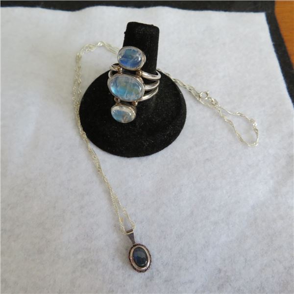 915 Silver jewellery lot with blue stones.  Includes 18" chain and pendant and a ring, approx size 8