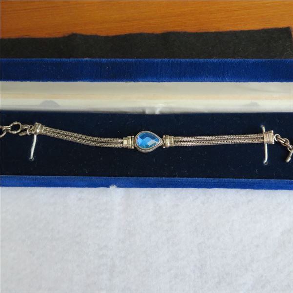 925 Silver bracelet.  Beautiful blue stone!  Marked 925 SARDA