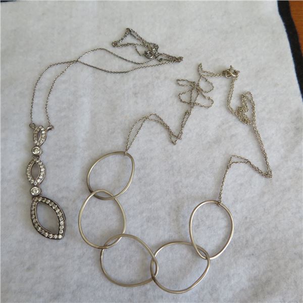 925 Silver lot - includes 2 necklaces with attached pendants.  Marked 925