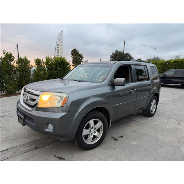 HOND PILOT 2010 O/S TITLE 2 DAYS