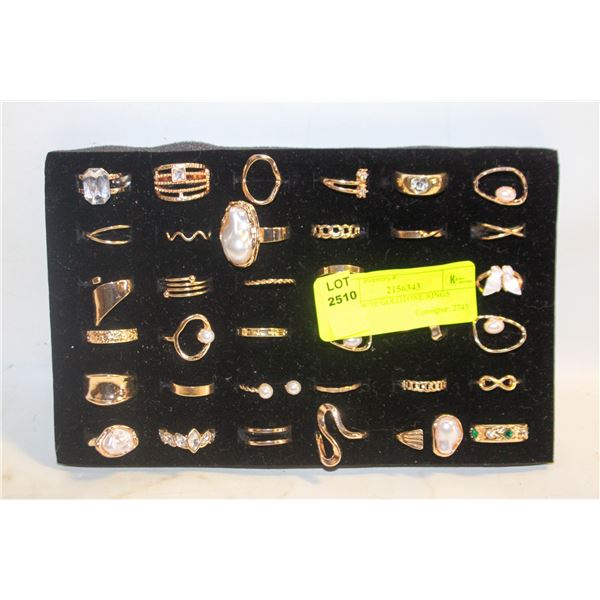 TRAY W/36 GOLDTONE RINGS