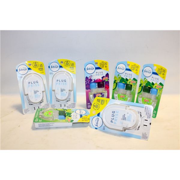 BIN OF FEBREEZE PLUG INS AND REFILLS