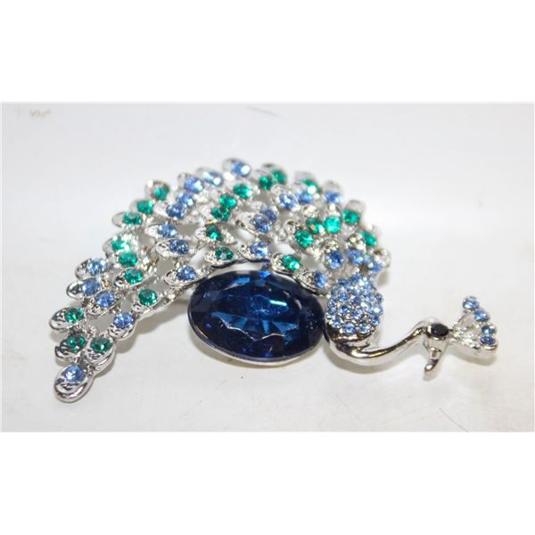 18) SILVER TONE WITH SHADES OF BLUE & GREEN