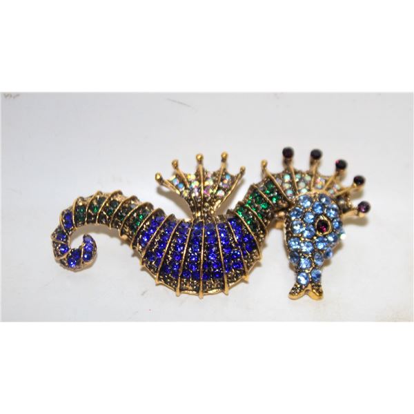 17)  GOLD TONE WITH BLUE, GREEN & RAINBOW