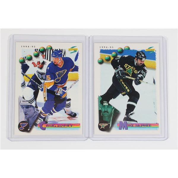 2 HOCKEY CARDS IN SLEEVES, CRAIG JANNEY..