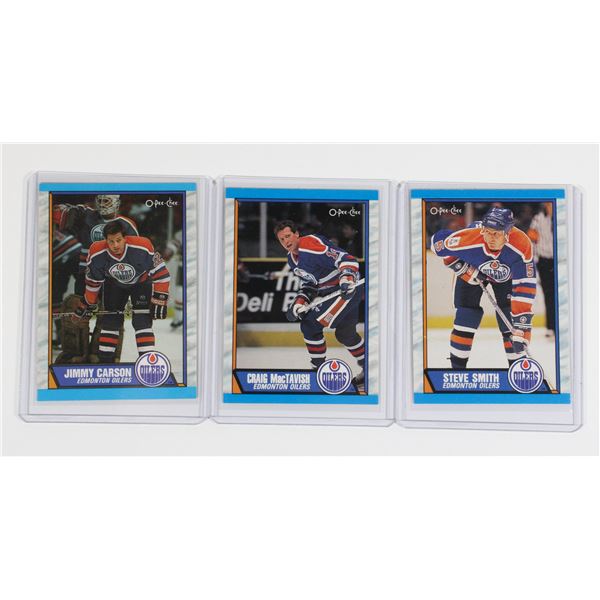 3 HOCKEY CARDS IN SLEEVES OILERS, STEVE SMITH..