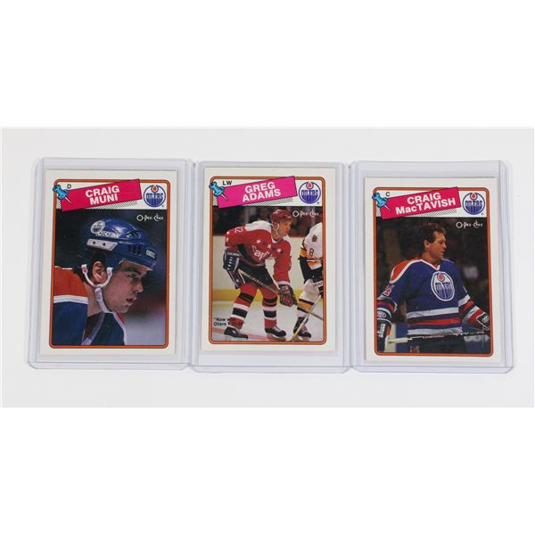 3 HOCKEY CARDS IN SLEEVES OILERS, CRAIG MUNI..
