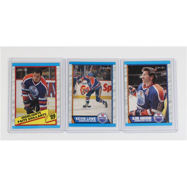 3 HOCKEY CARDS IN SLEEVES OILERS, TIKKANEN..