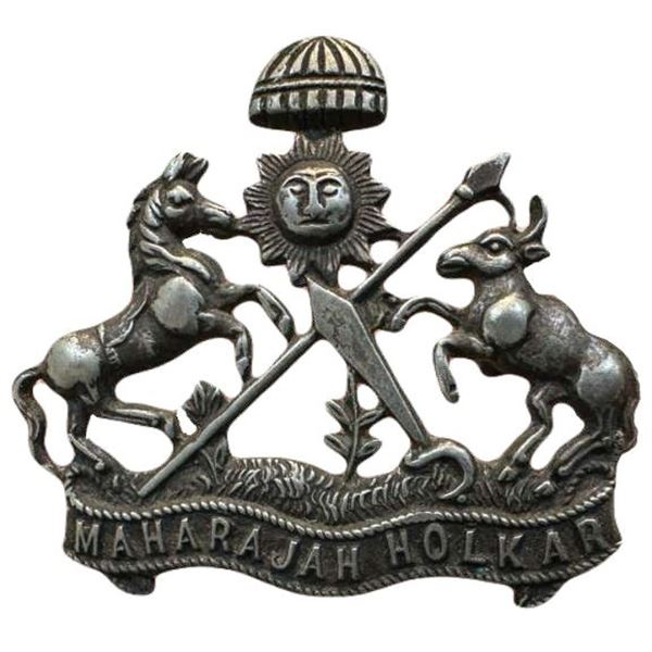 Princley state:Indore, Silver coat of Arms, 8.98g, sunburst at top flanked by horse and bull, spear 